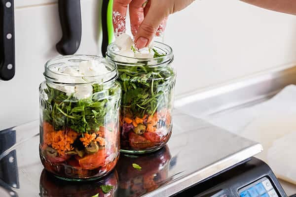 measuring food on a scale to measure the weight of it
