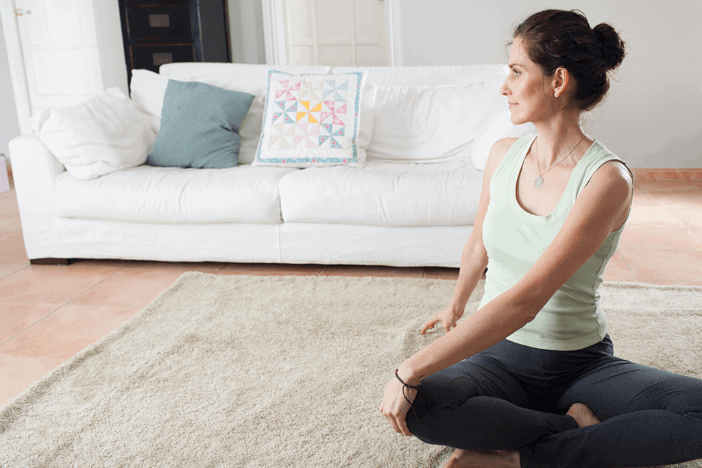 woman stretching, doing yoga