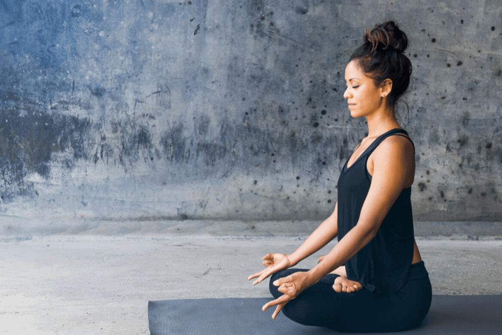 woman practicing yoga