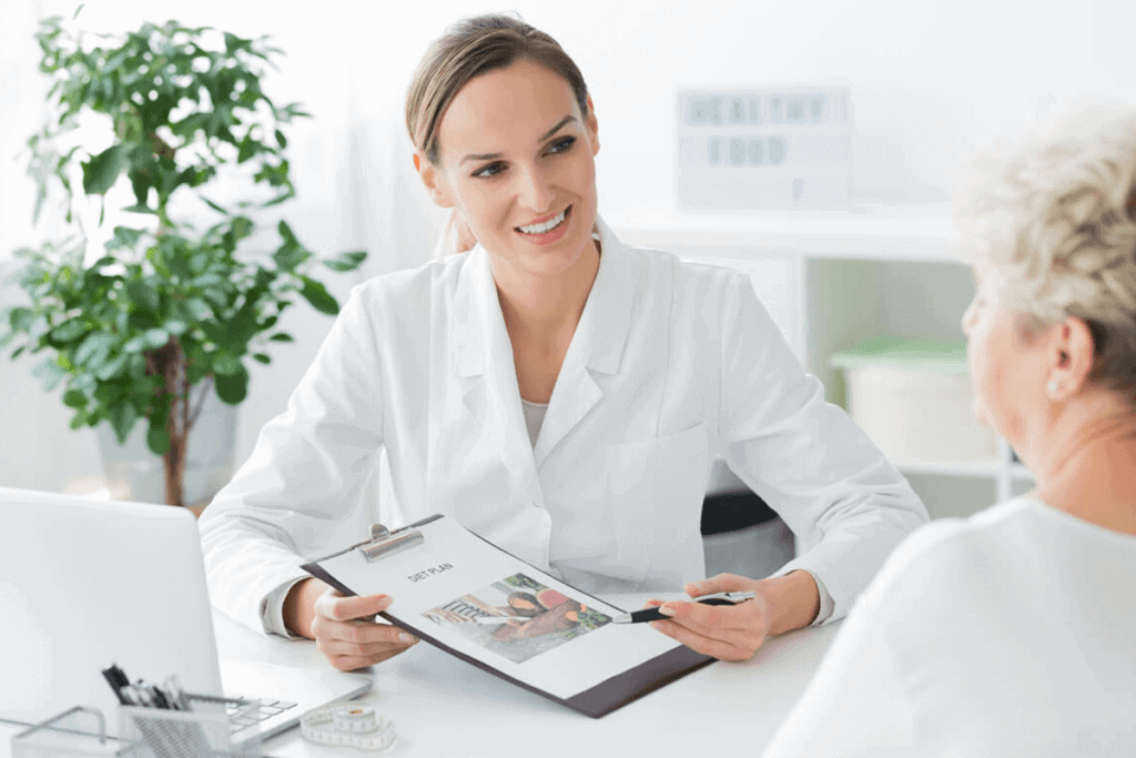 health practitioner talking to patient about a diet plan