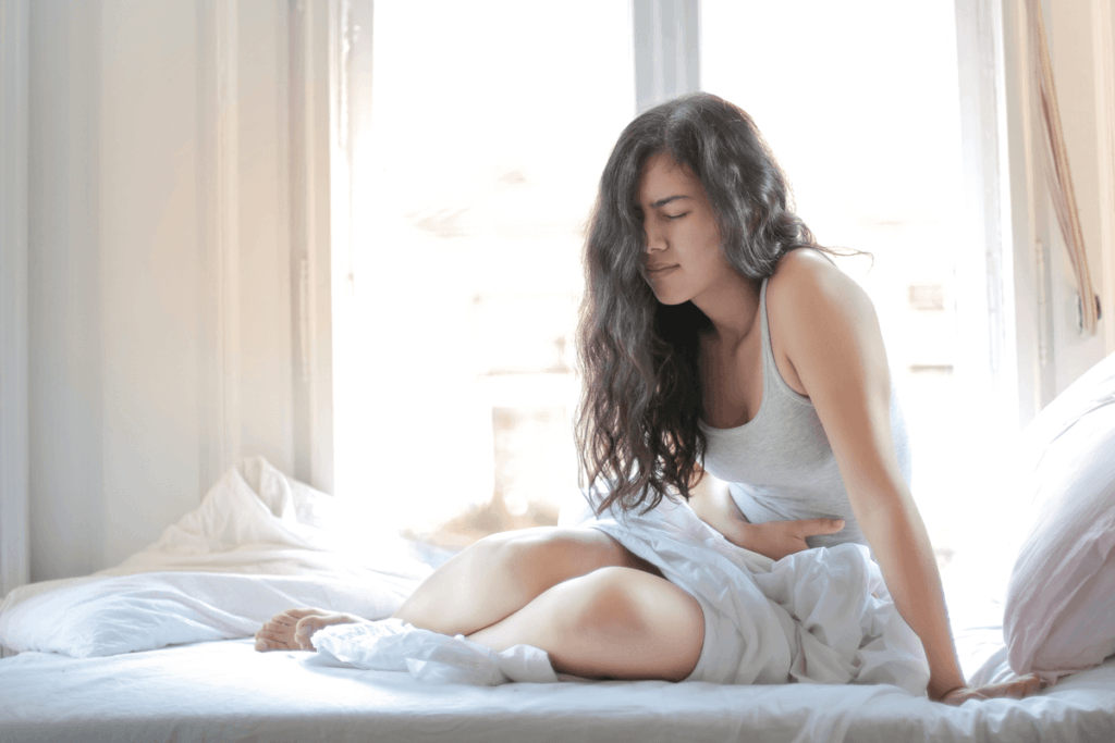 Image of woman laying in bed