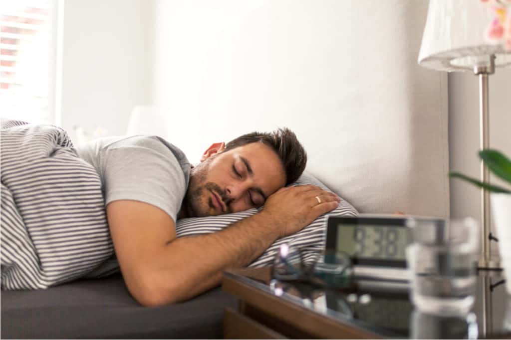 Man sleeping in bed